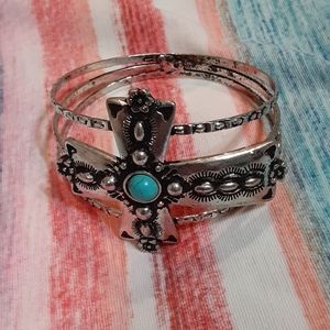 Silver metal cross bracelet with turquoise bead